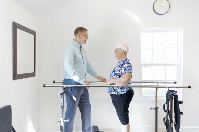 Post surgical gait training at the parallel bars