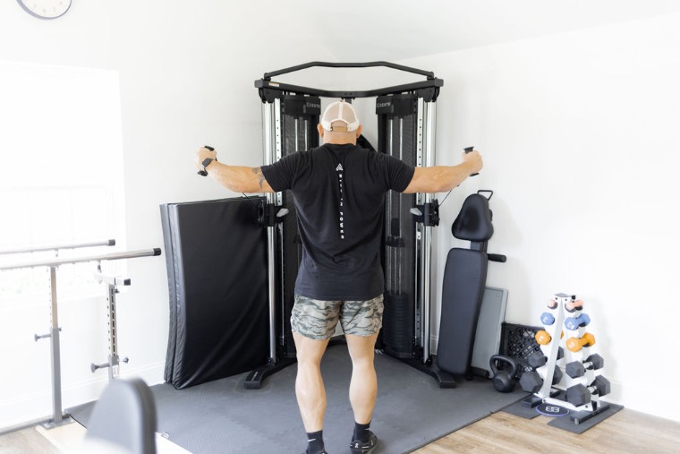 Athlete training on the cable machine in Roxboro, NC